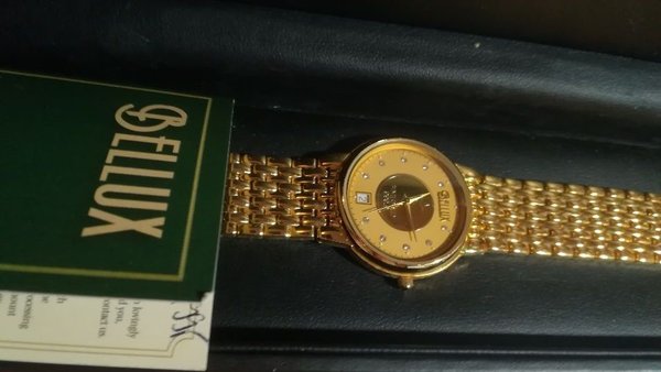 Echte BELLUX- Uhr mit Echtgold-Inlay