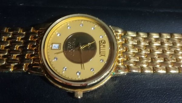 Echte BELLUX- Uhr mit Echtgold-Inlay